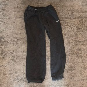 Gray, medium Nike sweatpants with pockets